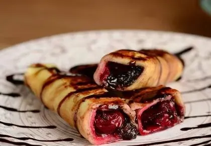2pcs Pancackes with cherry, chocolate & nuts
