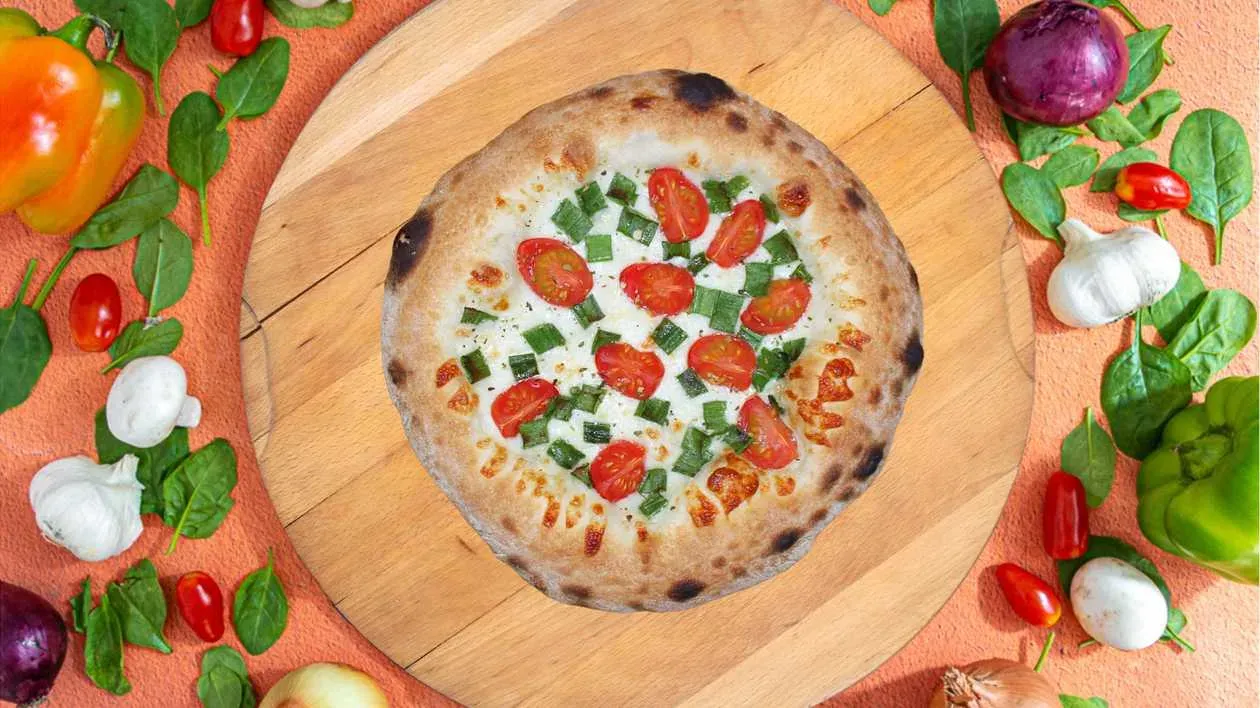 Focaccia with cheese, cherry tomatoes and green onions