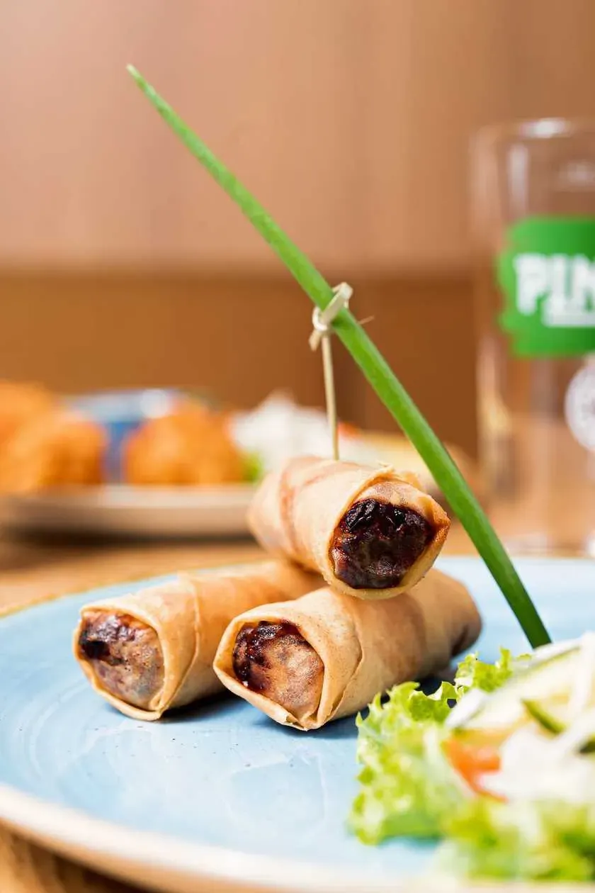 Fried Spring Rolls with Vegetables and Soy Noodles Served with Sweet and Sour Sauce