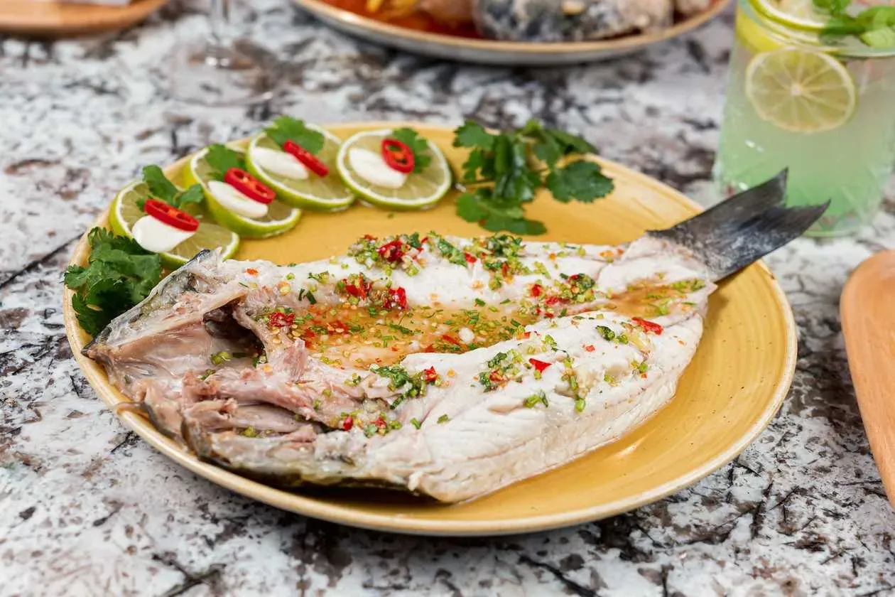 Steamed Seabass in Lemon Broth with Garlic and Coriander