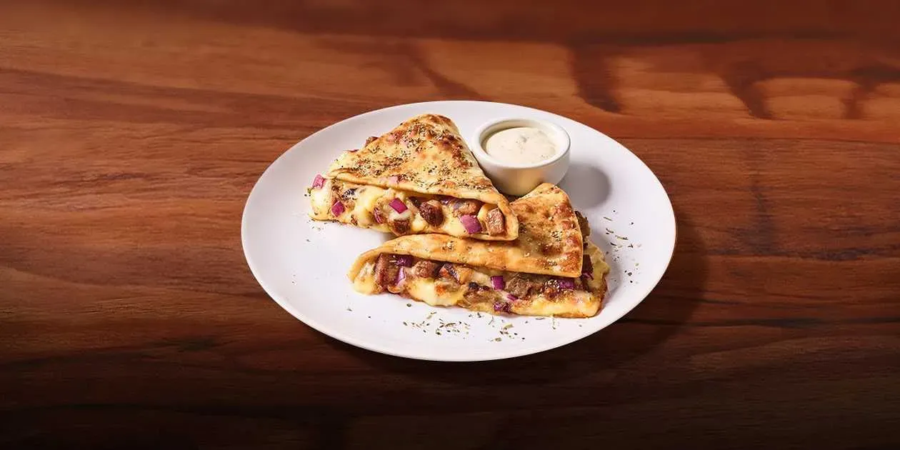 MELTS MEAT THE CHEESE