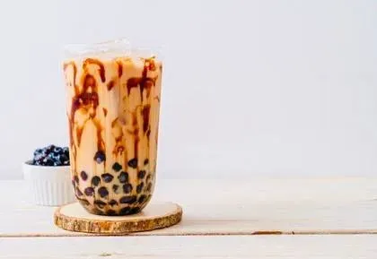Coffee with caramel sauce, tapica.