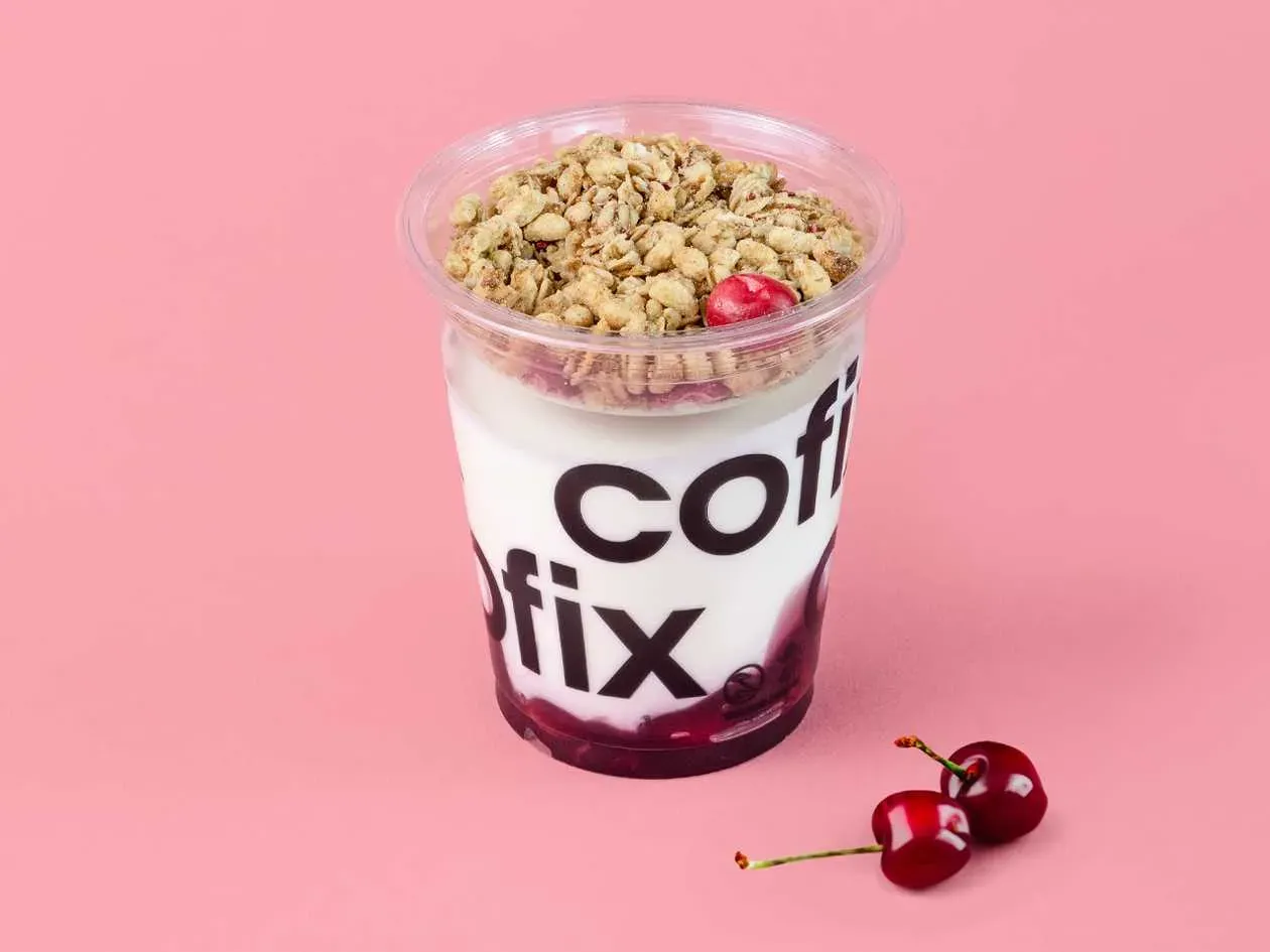 Yogurt with granola and cherries