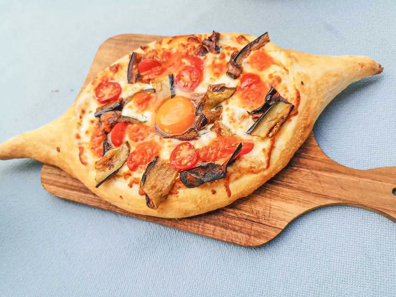 Khachapuri Adjarian with Eggplants and tomato