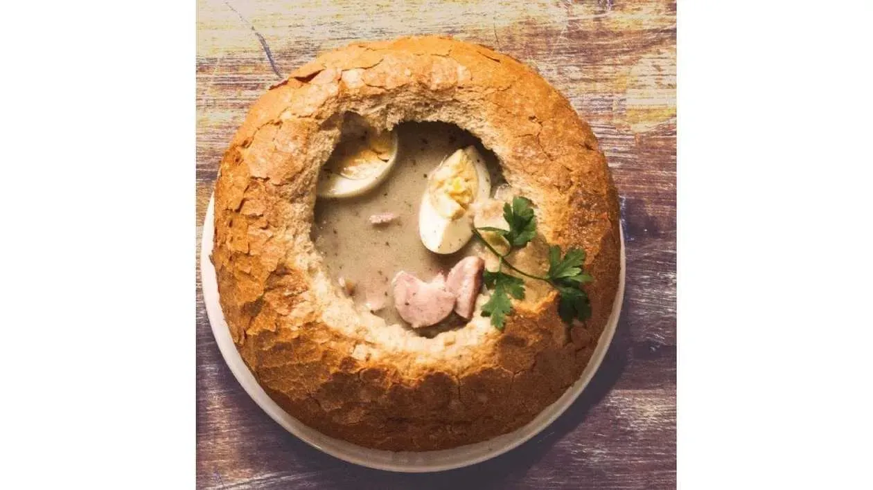 Sour rye soup with sausage and egg