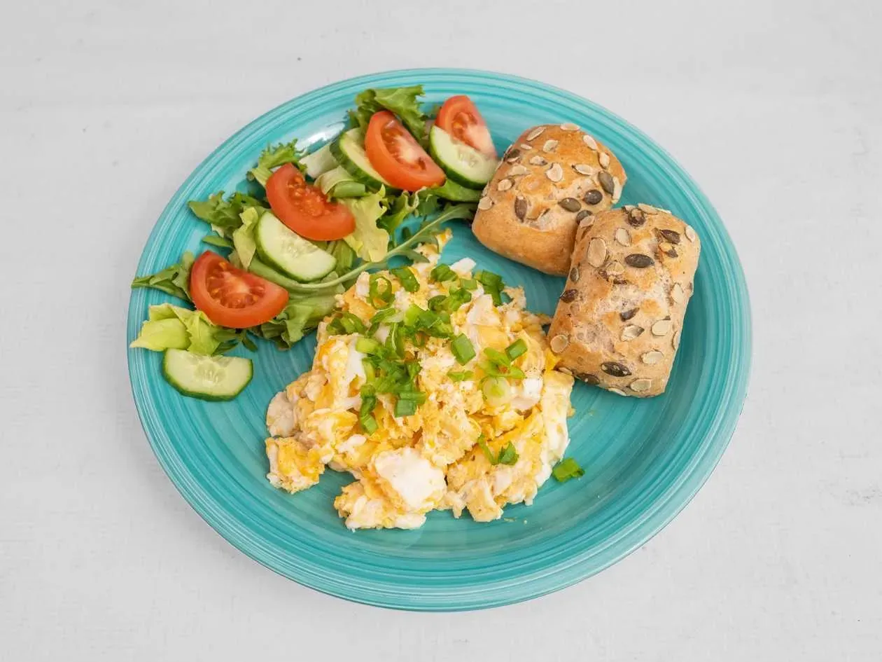 Scrambled Eggs with Chanterelles, Chives, Butter, Bread, Tomato, Green Cucumber, Chives