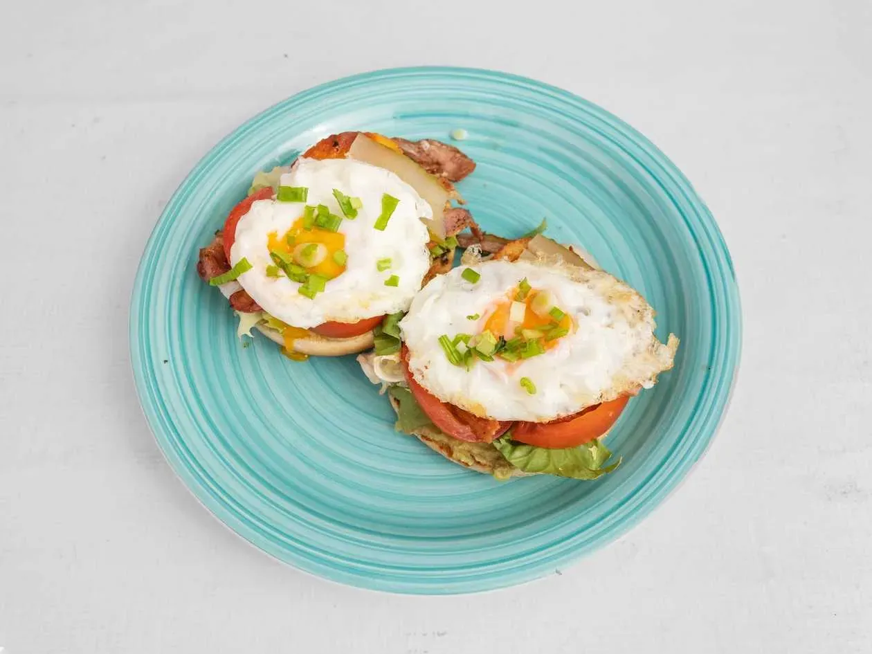 Grilled Sheep's Cheese with Bacon and Fried Egg On Butter Bun