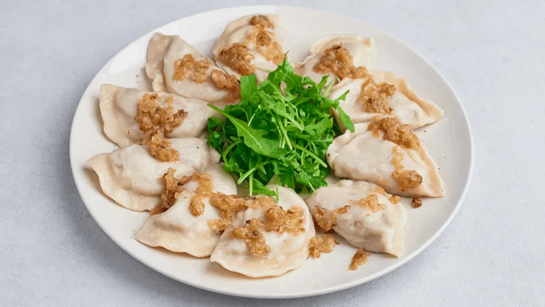 Pierogi z pieczarkami, serem i cebulą 10 szt.