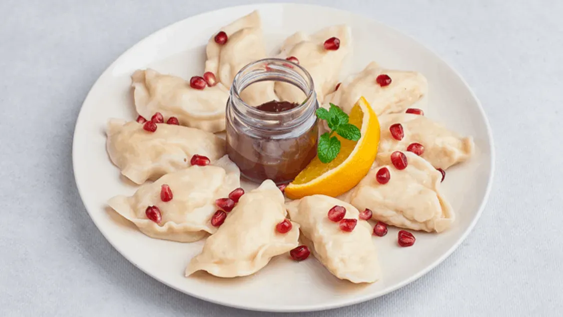 Pierogi z chałwą, białą czekoladą i malinami 10 szt.