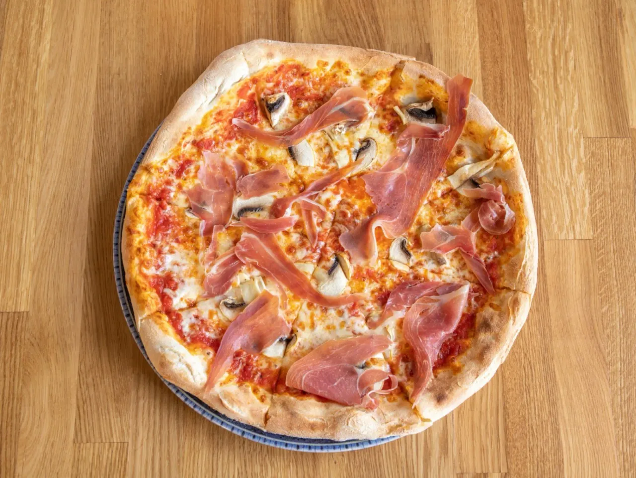 PROSCITTO E FUNGHI