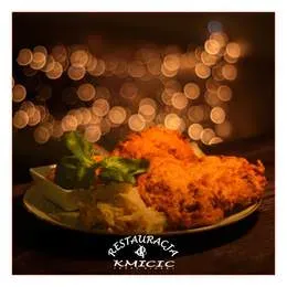 Kotlet schabowy z ziemniakami i kapustą. (150 g)