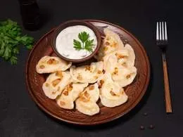 Pierogi z ziemniakami i ze skwarkami - 10 szt (330 g)