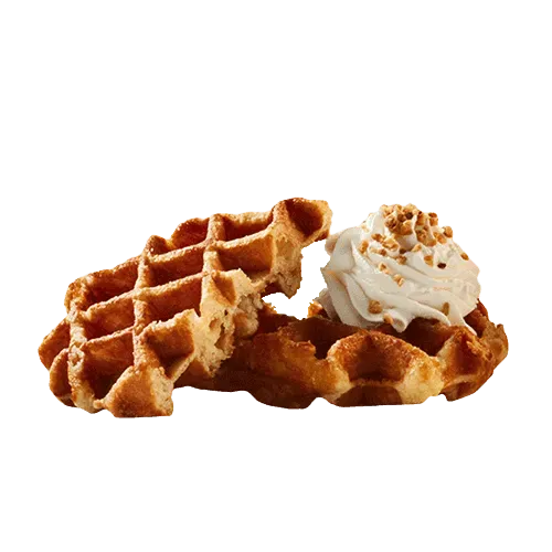 Waffle with whipped cream and strawberries