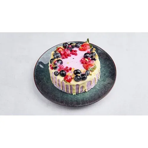 Tort śmietanowo - jagodowy 1.3 kg