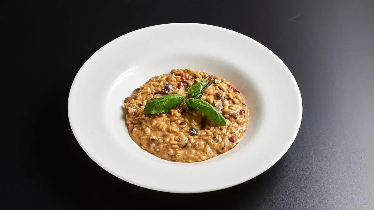 Risotto alla parmigiana con prosciutto crudo