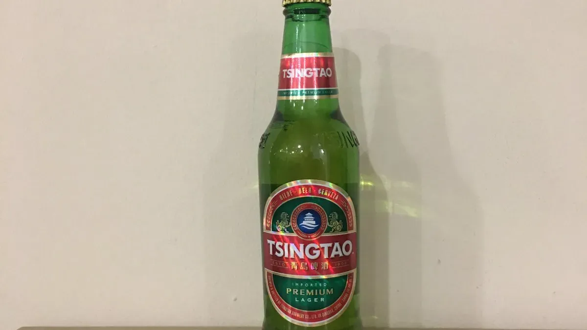 S03 Tsing Tao sör (330 ml) 青岛