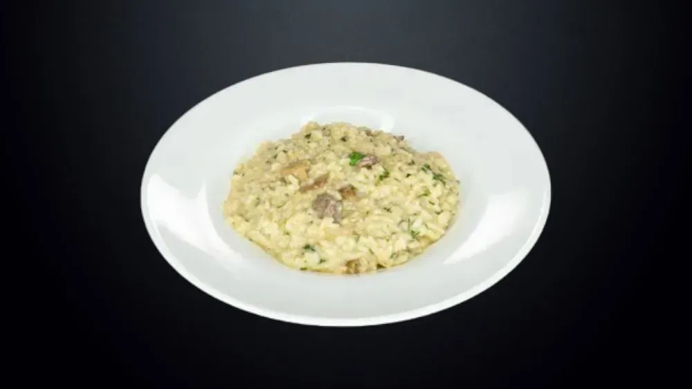 Risotto funghi porcini e filetto di maiale