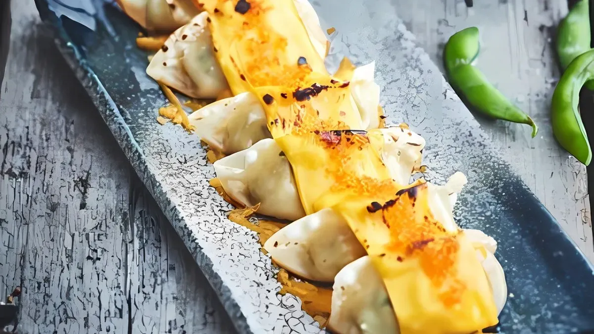 Koreai Gyoza Cheddar Sajt(Sertés)( Csirkés)( Tofus)( Marha)(Kimchi Csirkes)