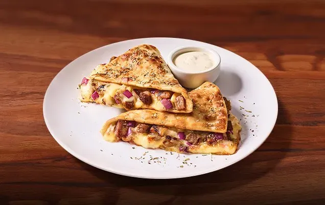 MELTS MEAT THE CHEESE